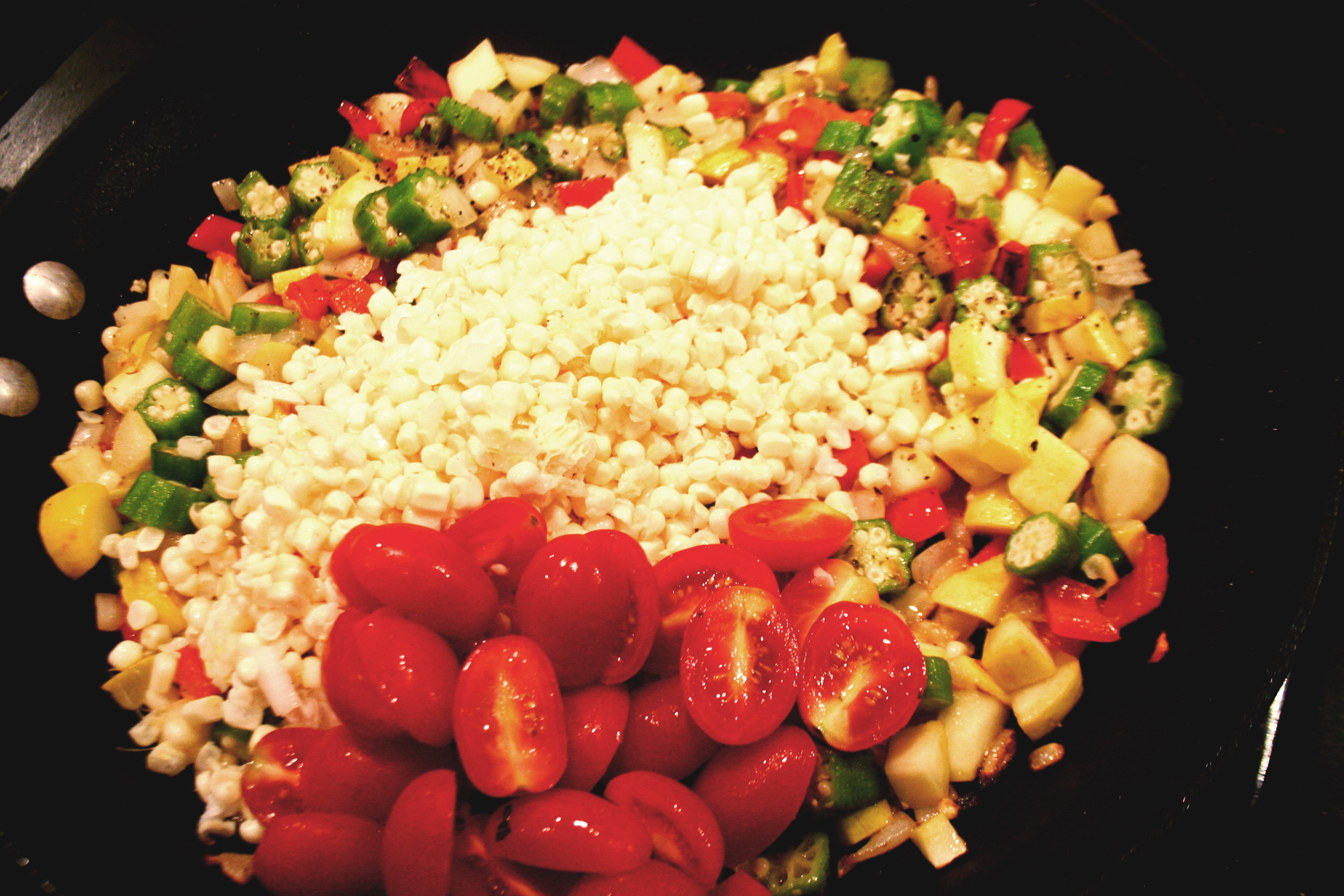 Sauteing the summer vegetables for succotash