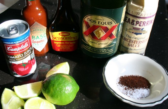Ingredients for Michelada, tomato beer cocktail